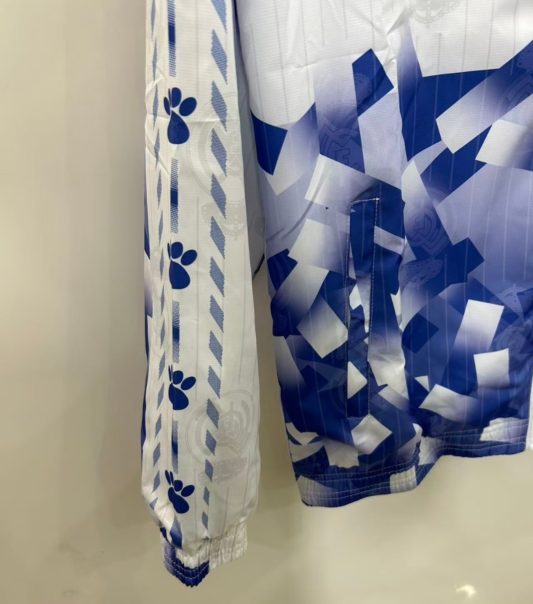 25/26 Real Madrid White with Blue Geometric Pattern Windbreaker