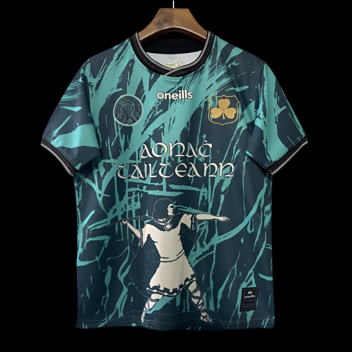 25/26 Tipperary GAA Teal with Warrior Silhouette and Abstract Brushstroke Pattern Jersey